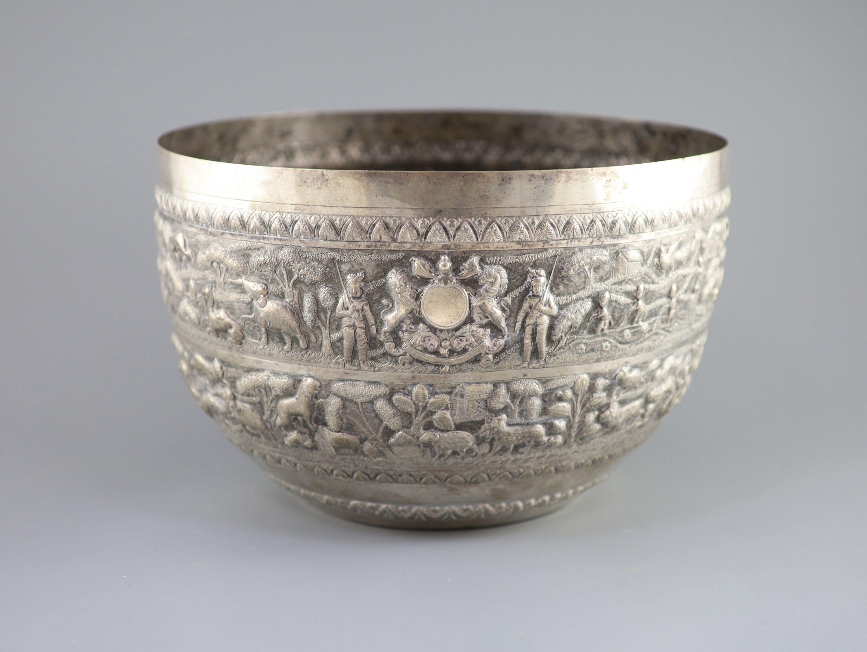 A large late 19th century Indian export embossed silver bowl, diameter 31.2cm, height 20.1cm, 36oz.